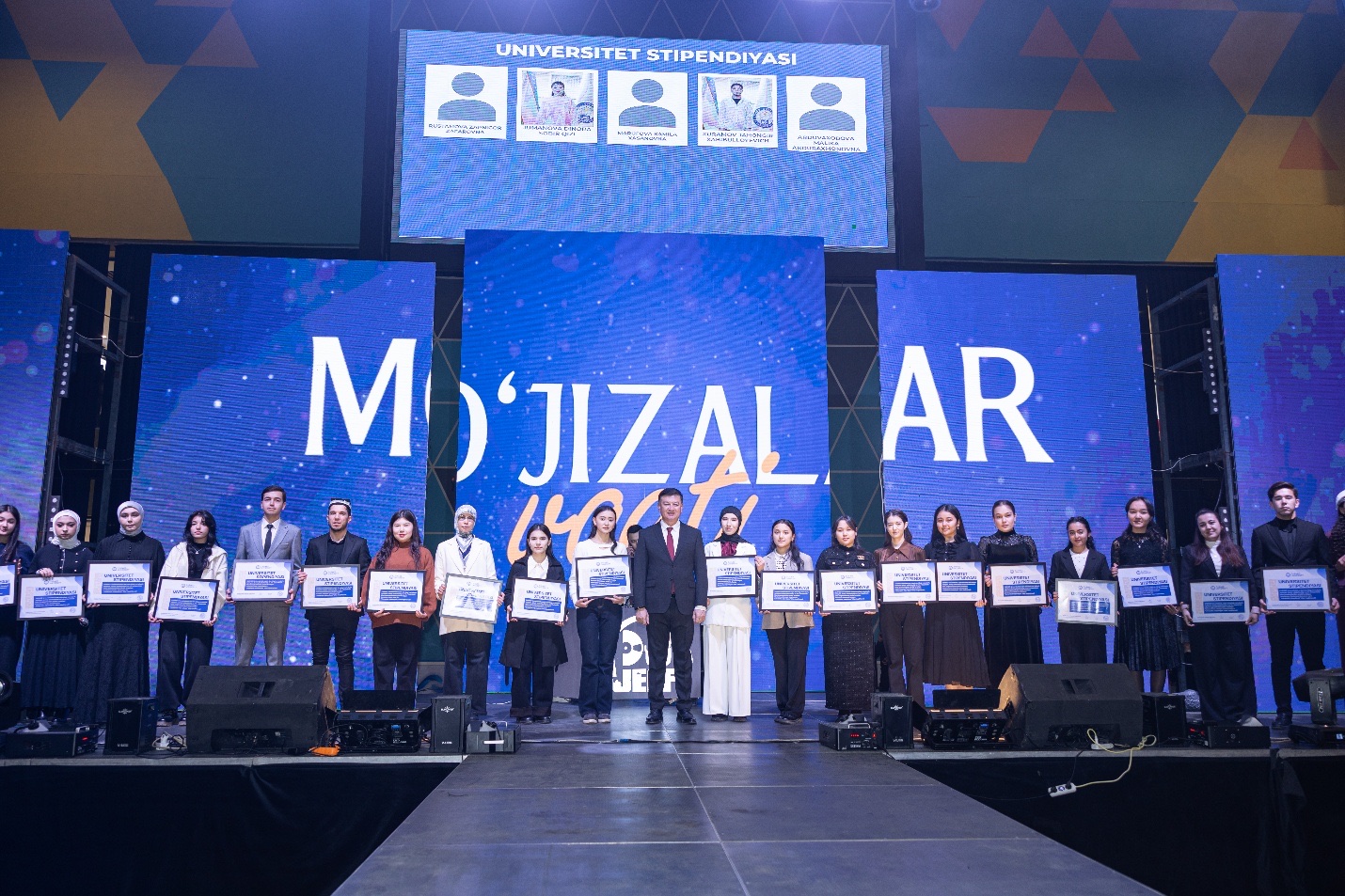 Grant award ceremony wide view on stage